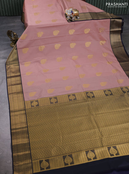 Semi kanchipuram silk saree pastel pink and navy blue with zari woven buttas and zari woven border