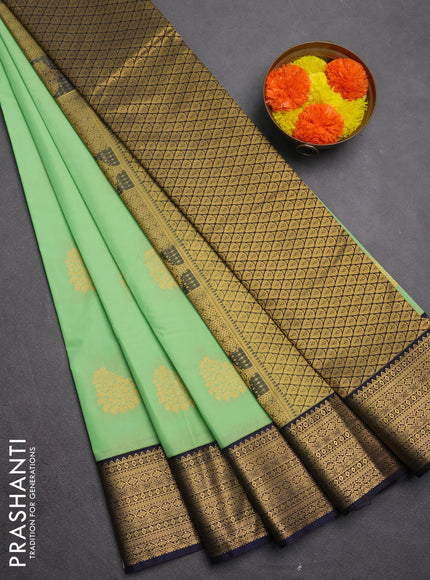 Semi kanchipuram silk saree pista green and navy blue with zari woven buttas and zari woven border