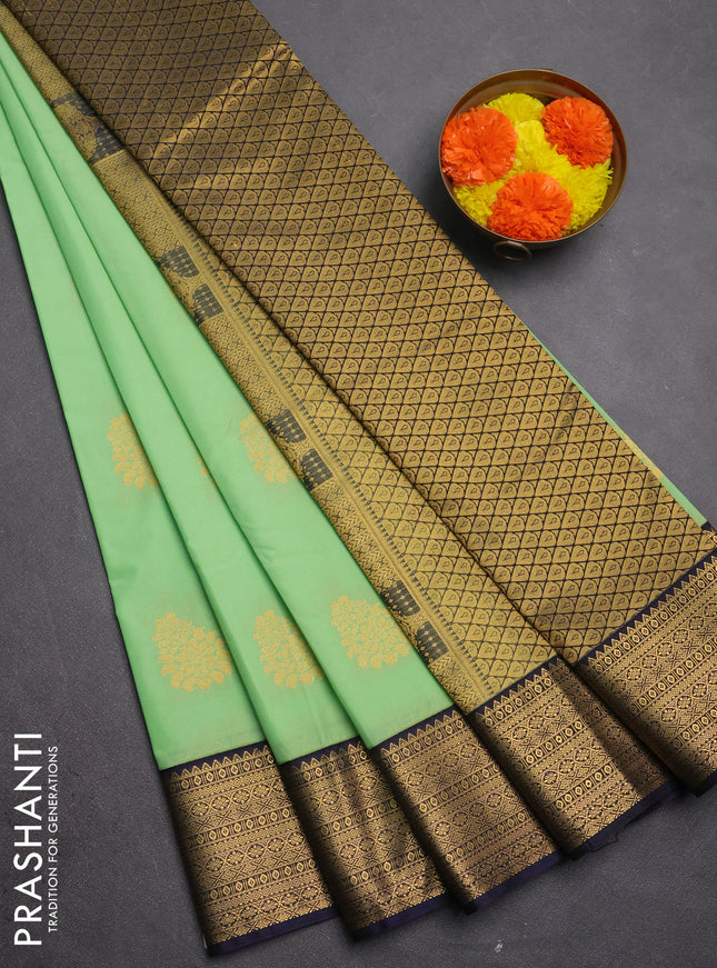 Semi kanchipuram silk saree pista green and navy blue with zari woven buttas and zari woven border