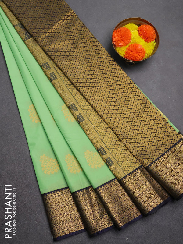 Semi kanchipuram silk saree pista green and navy blue with zari woven buttas and zari woven border