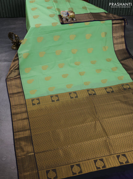 Semi kanchipuram silk saree pista green and navy blue with zari woven buttas and zari woven border