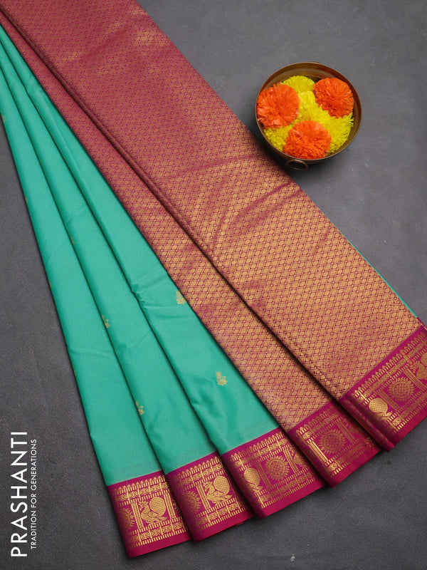 Semi kanchipuram silk saree teal green and pink with zari woven buttas and zari woven border
