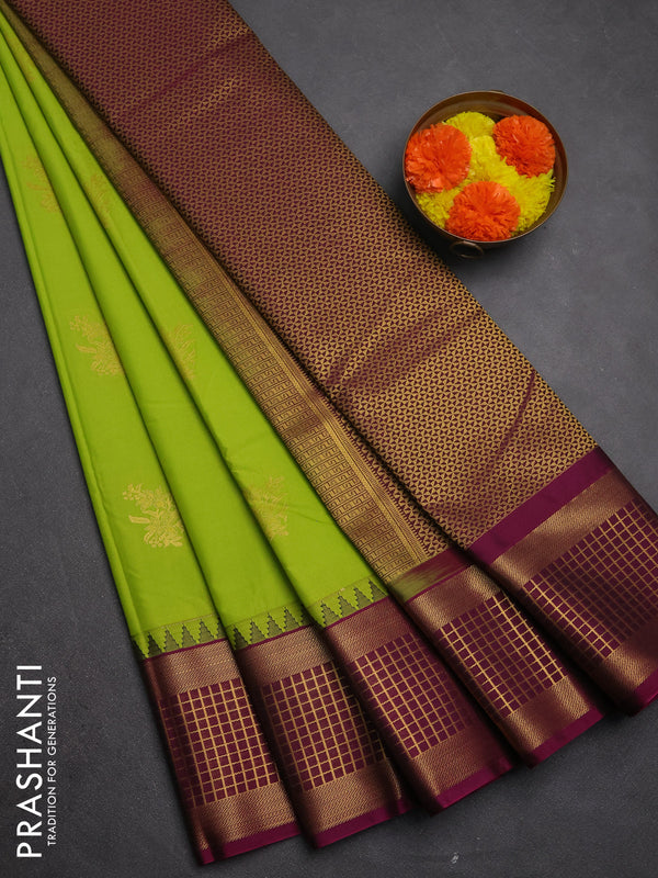 Semi kanchipuram silk saree light green and magenta pink with zari woven buttas and temple design zari woven border