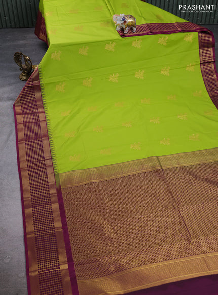 Semi kanchipuram silk saree light green and magenta pink with zari woven buttas and temple design zari woven border