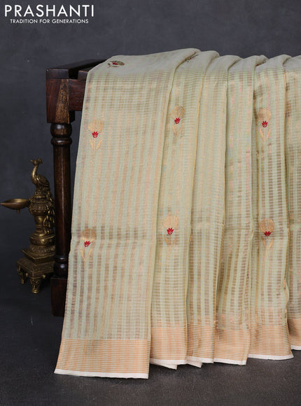 Pure chanderi silk saree pista green with allover stripes & buttas and zari woven border