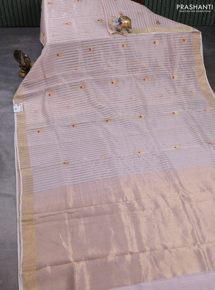 Pure chanderi silk saree peach shade with allover stripes & buttas and zari woven border