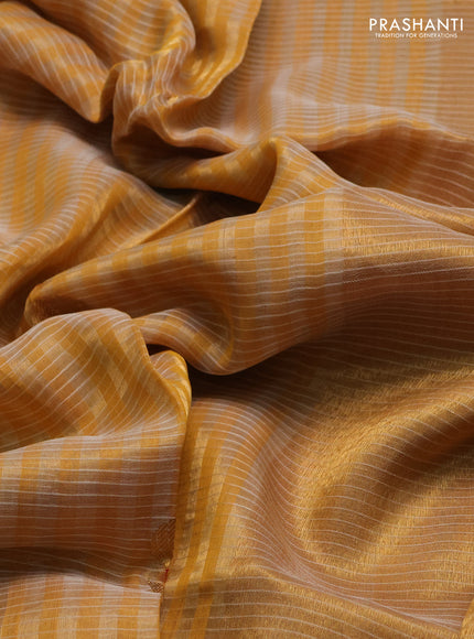 Pure chanderi silk saree sandal with allover checked pattern and zari woven border