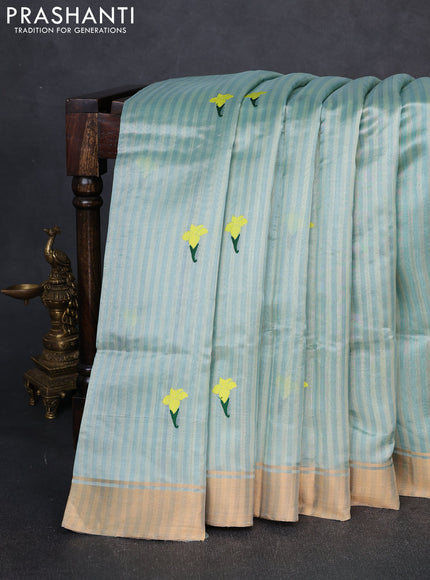 Pure chanderi silk saree pastel blue with allover stripes pattern & buttas and zari woven border