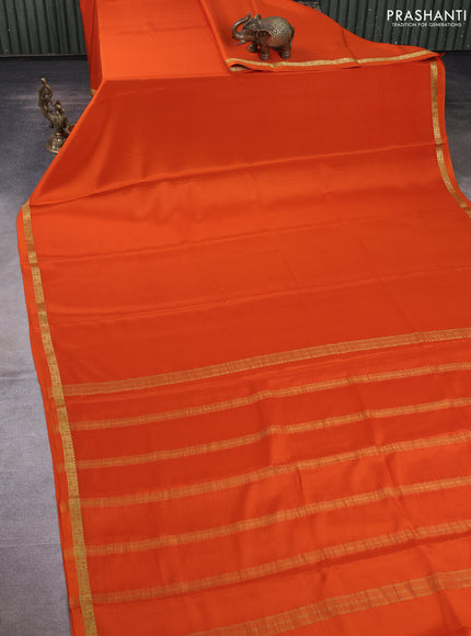 Pure mysore silk saree rust shade with plain body and small zari woven border
