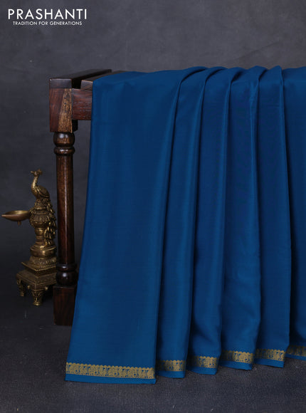 Pure mysore silk saree peacock blue with plain body and small zari woven border