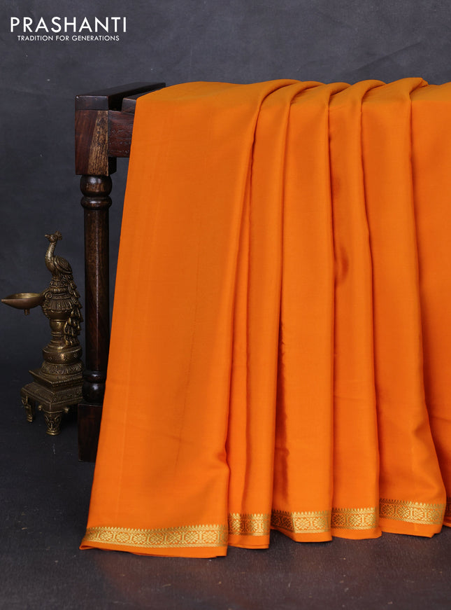 Pure mysore silk saree orange with plain body and small zari woven border
