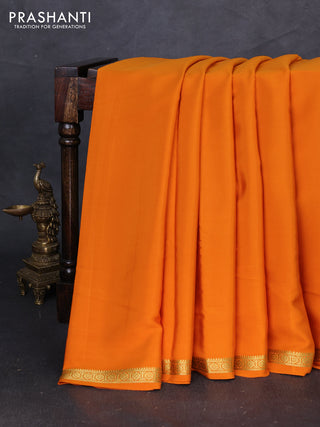 Pure mysore silk saree orange with plain body and small zari woven border