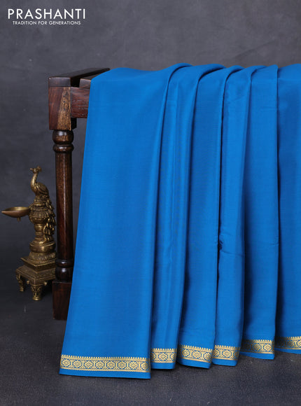 Pure mysore silk saree teal blue with plain body and small zari woven border