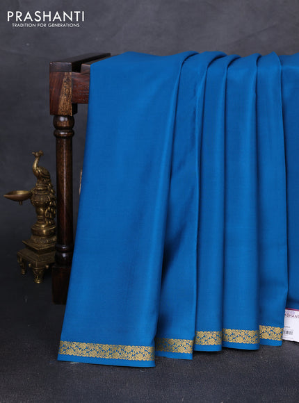 Pure mysore silk saree peacock blue with plain body and small zari woven border