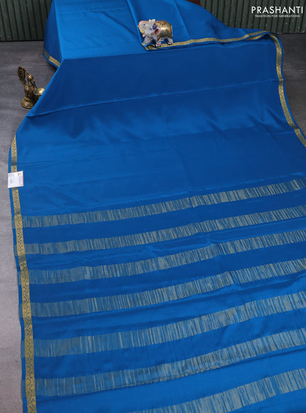 Pure mysore silk saree peacock blue with plain body and small zari woven border