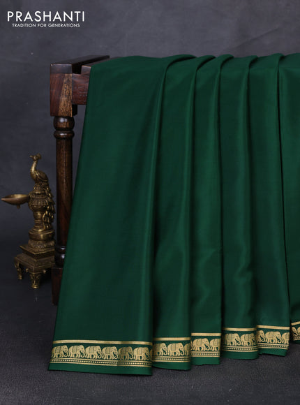 Pure mysore silk saree bottle green with plain body and small zari woven border