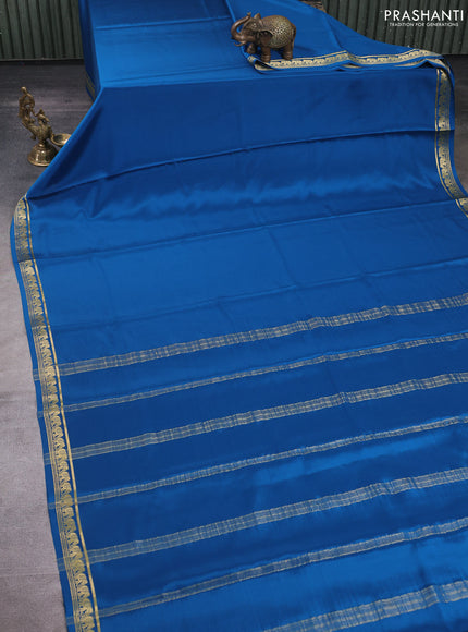 Pure mysore silk saree peacock blue with plain body and small zari woven border