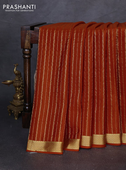 Pure mysore silk saree rustic orange with allover zari weaves and zari woven border
