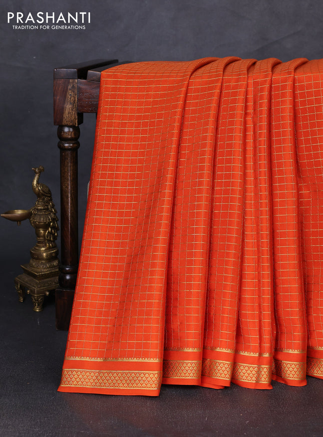 Pure mysore silk saree rust shade with allover zari checked pattern and small zari woven border