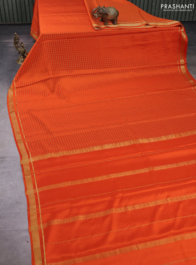 Pure mysore silk saree rust shade with allover zari checked pattern and small zari woven border