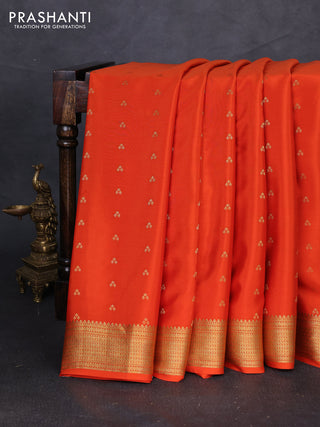 Pure mysore silk saree orange with allover zari woven buttas and zari woven border