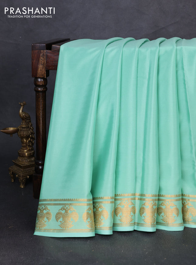 Pure mysore silk saree teal green with plain body and zari woven buttas