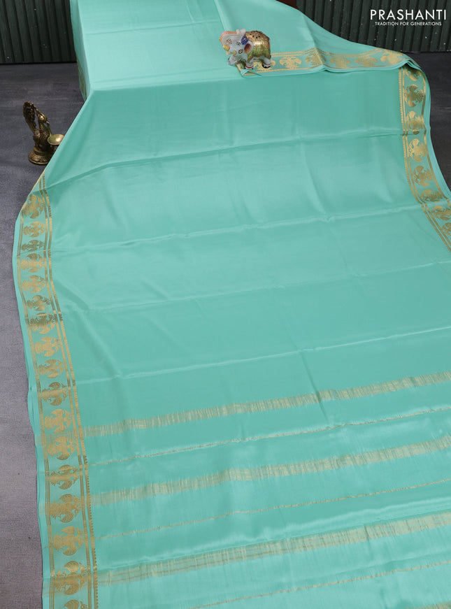 Pure mysore silk saree teal green with plain body and zari woven buttas