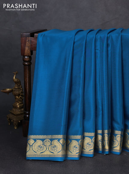 Pure mysore silk saree peacock blue with plain body and annam zari woven butta border