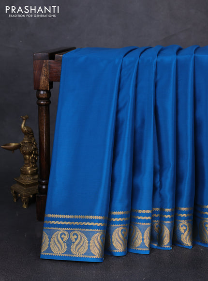 Pure mysore silk saree peacock blue with plain body and zari woven border