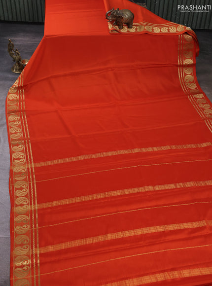 Pure mysore silk saree rust shade with plain body and paisley zari woven butta border