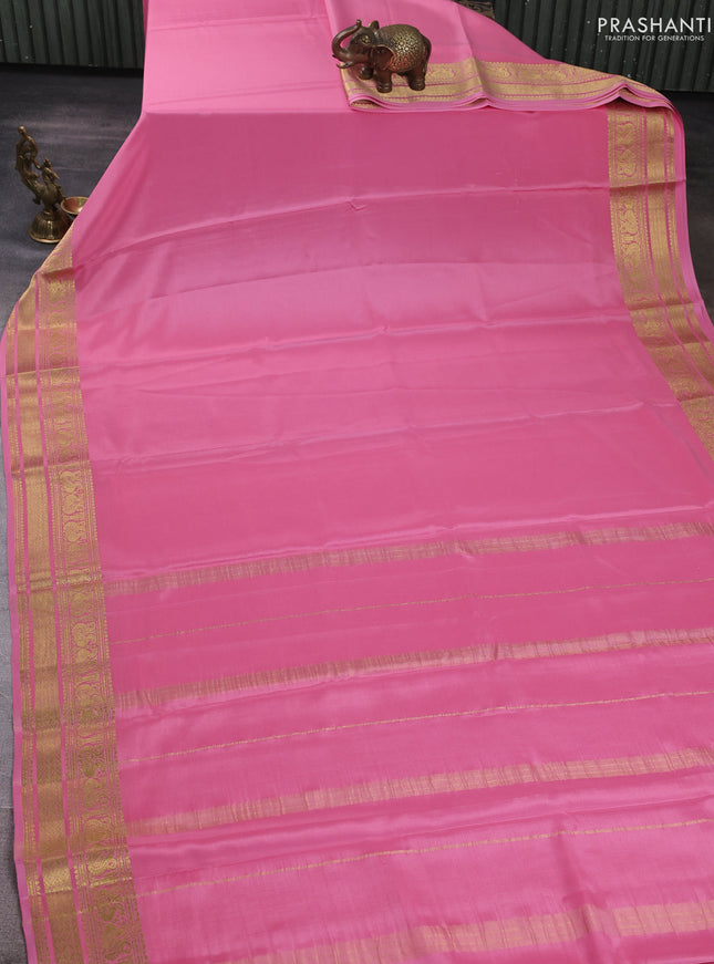Pure mysore silk saree peach pink with plain body and zari woven border