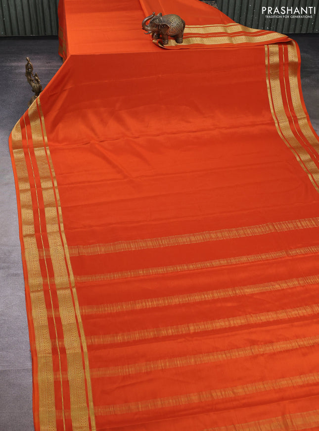 Pure mysore silk saree rust shade with plain body and zari woven border