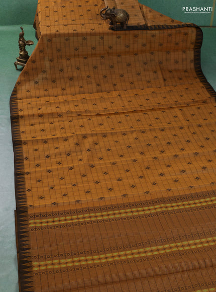 Kora silk cotton saree mustard yellow and black with allover thread checks & buttas and temple design thread woven border
