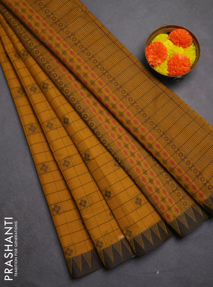 Kora silk cotton saree mustard yellow and black with allover thread checks & buttas and temple design thread woven border