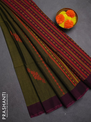 Kora silk cotton saree elaichi green and dark magenta pink with allover thread weaves and buttas and simple border