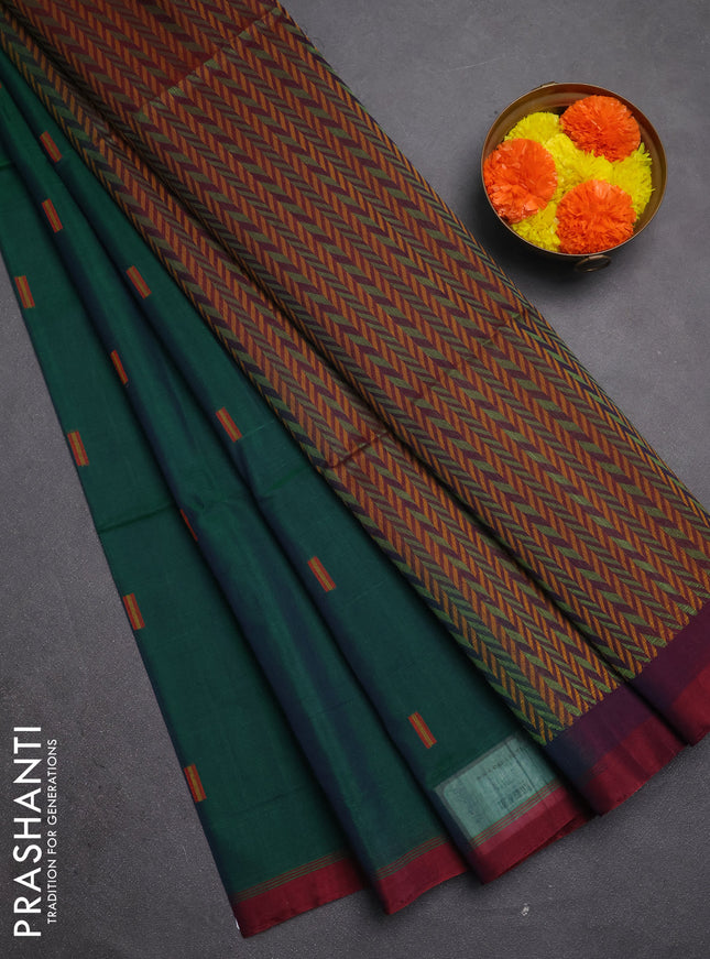 Kora silk cotton saree green and maroon with allover thread woven buttas and simple border