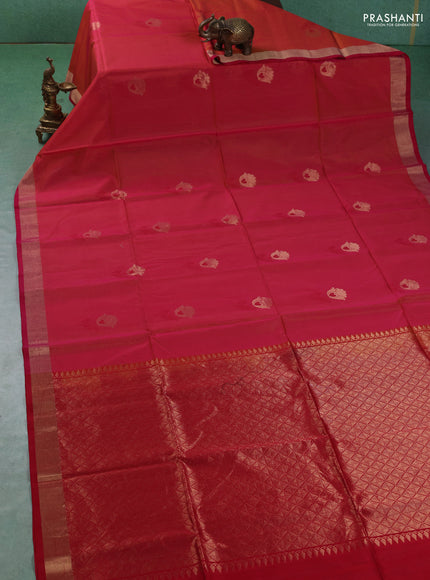 Kora silk cotton saree dual shade of pinkish red and red with floral thread & zari woven buttas and zari woven border