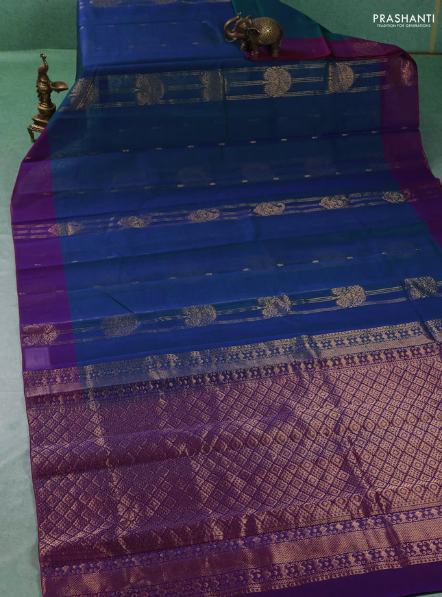 Kora silk cotton saree peacock blue and purple with allover zari weaves and zari woven butta border