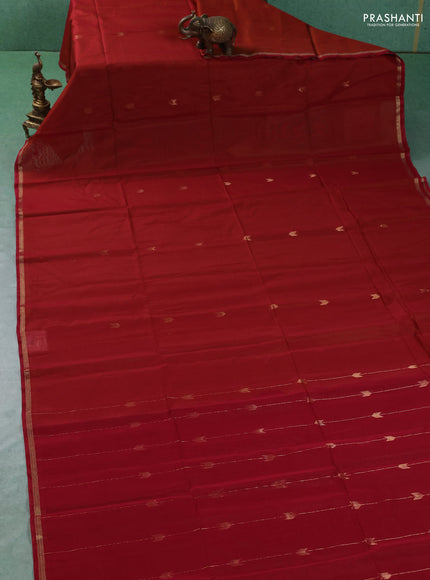 Kora silk cotton saree rust shade and maroon with zari woven buttas and zari woven piping border