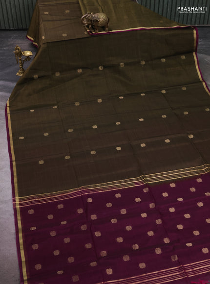 Kora silk cotton saree olive green and dark magenta pink with zari woven buttas and zari woven piping border
