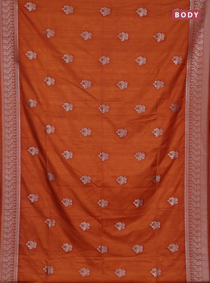 Semi soft silk saree rust shade with allover zari woven buttas and zari woven border
