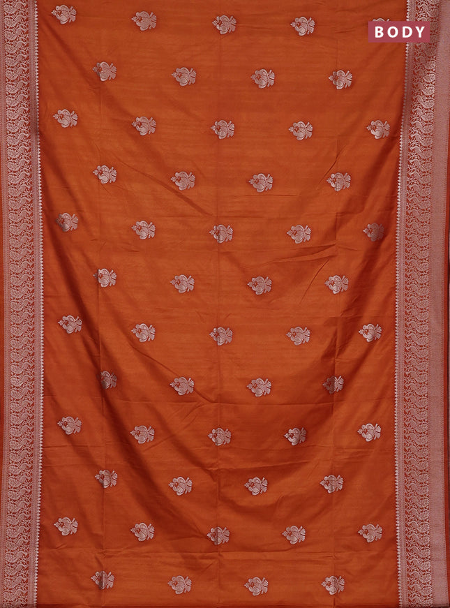 Semi soft silk saree rust shade with allover zari woven buttas and zari woven border