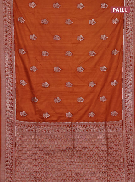 Semi soft silk saree rust shade with allover zari woven buttas and zari woven border