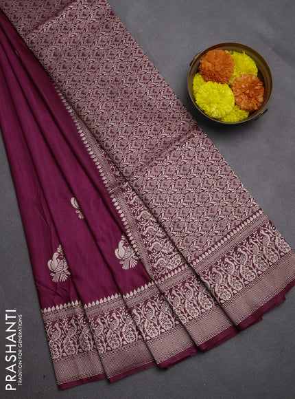 Semi soft silk saree wine shade with allover zari woven buttas and zari woven border