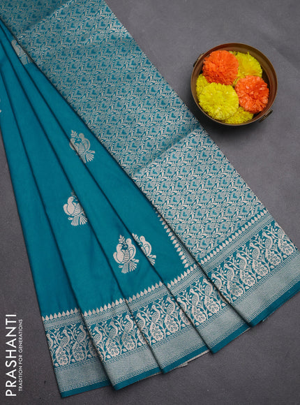 Semi soft silk saree teal blue with allover zari woven buttas and zari woven border