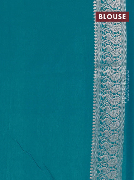 Semi soft silk saree teal blue with allover zari woven buttas and zari woven border