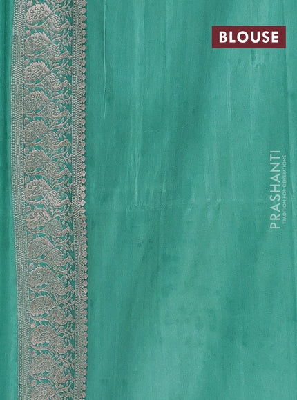 Semi soft silk saree pastel green with allover zari woven buttas and zari woven border