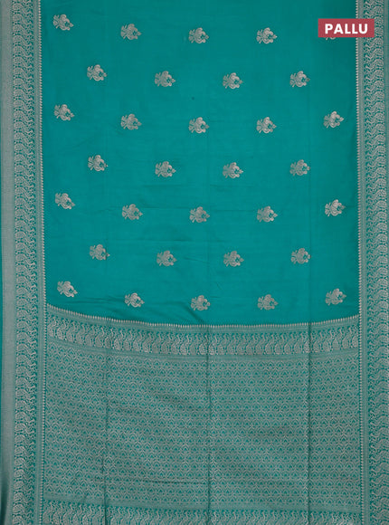 Semi soft silk saree teal blue with allover zari woven buttas and zari woven border
