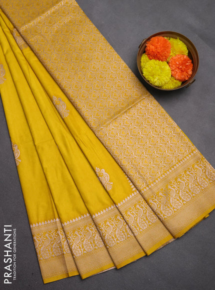 Semi soft silk saree mustard yellow with allover zari woven buttas and zari woven border