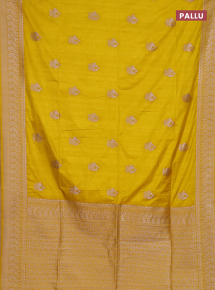 Semi soft silk saree mustard yellow with allover zari woven buttas and zari woven border